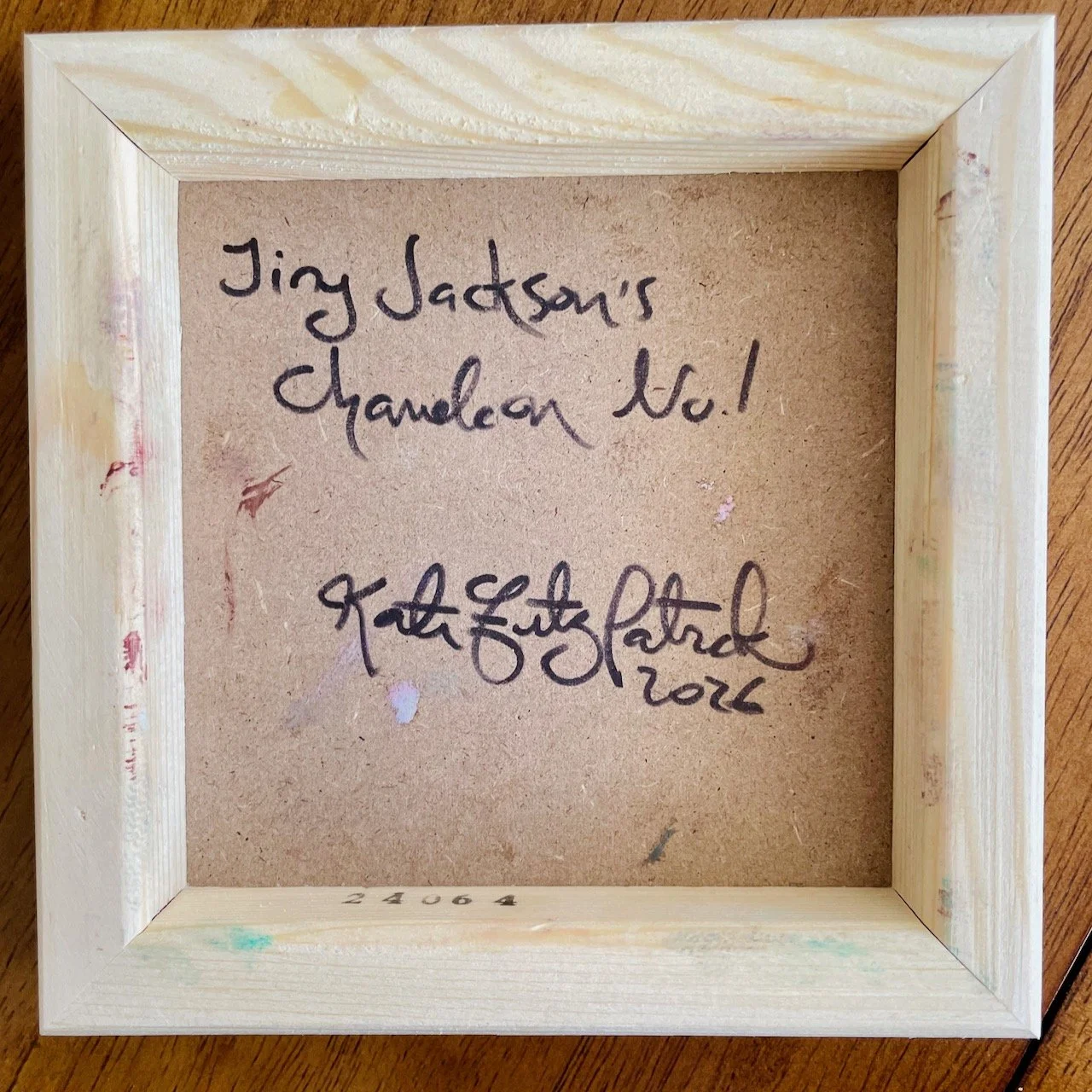 back of the cradled wood reads Tiny Jackson's Chameleon no. 1 kate fitzpatrick 2026