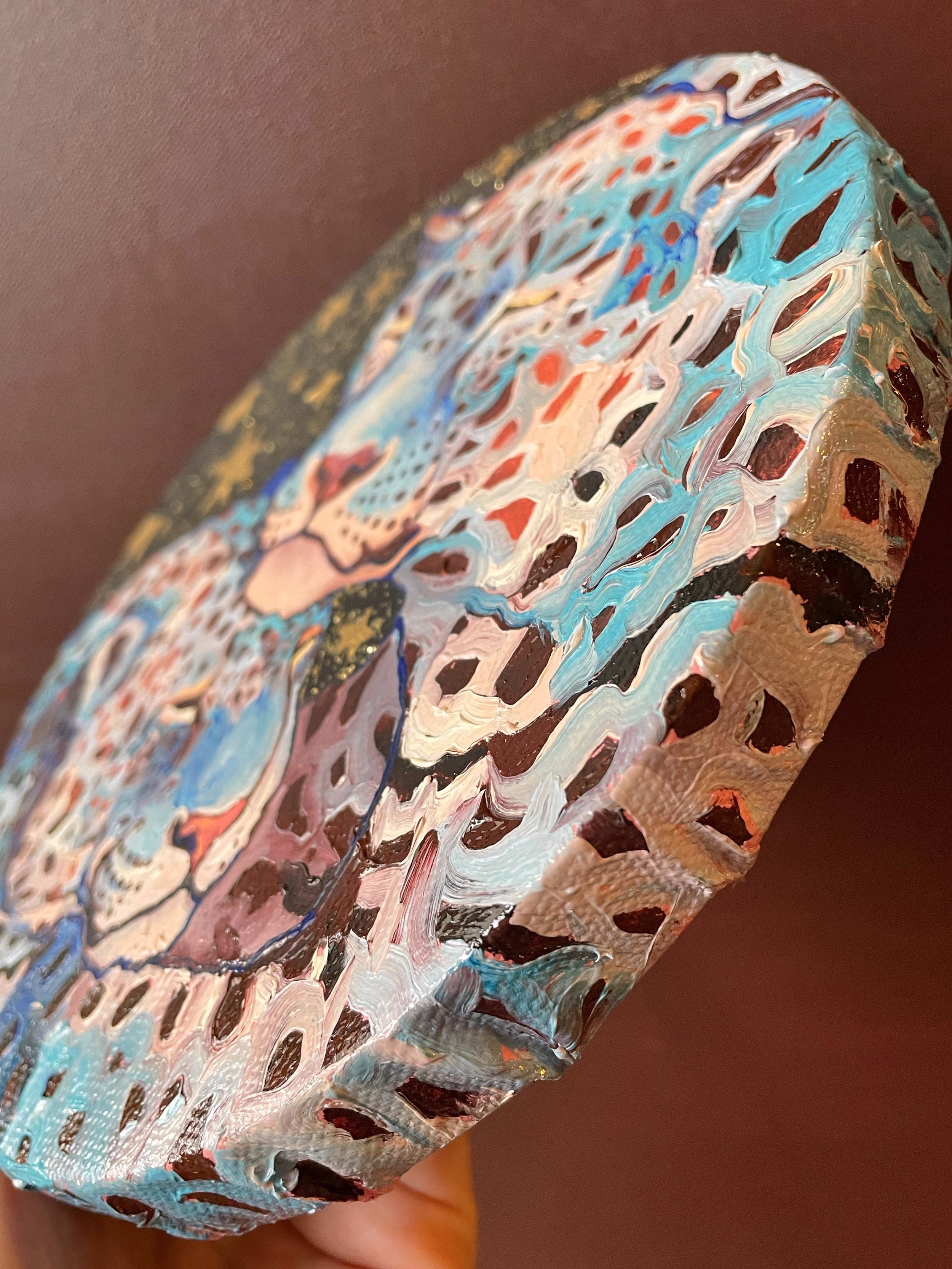 a side view on the blue leopard canvas painting