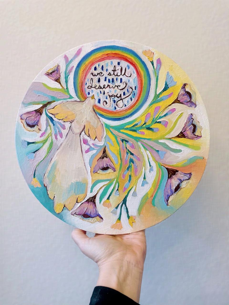 a colorful round painting