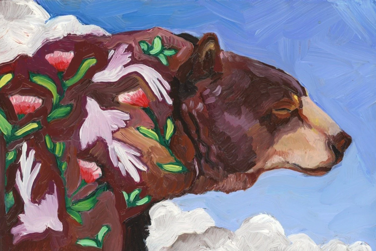 a painting of a brown bear against a blue sky with clouds. Inside the bear's fur are white birds and red flowers.