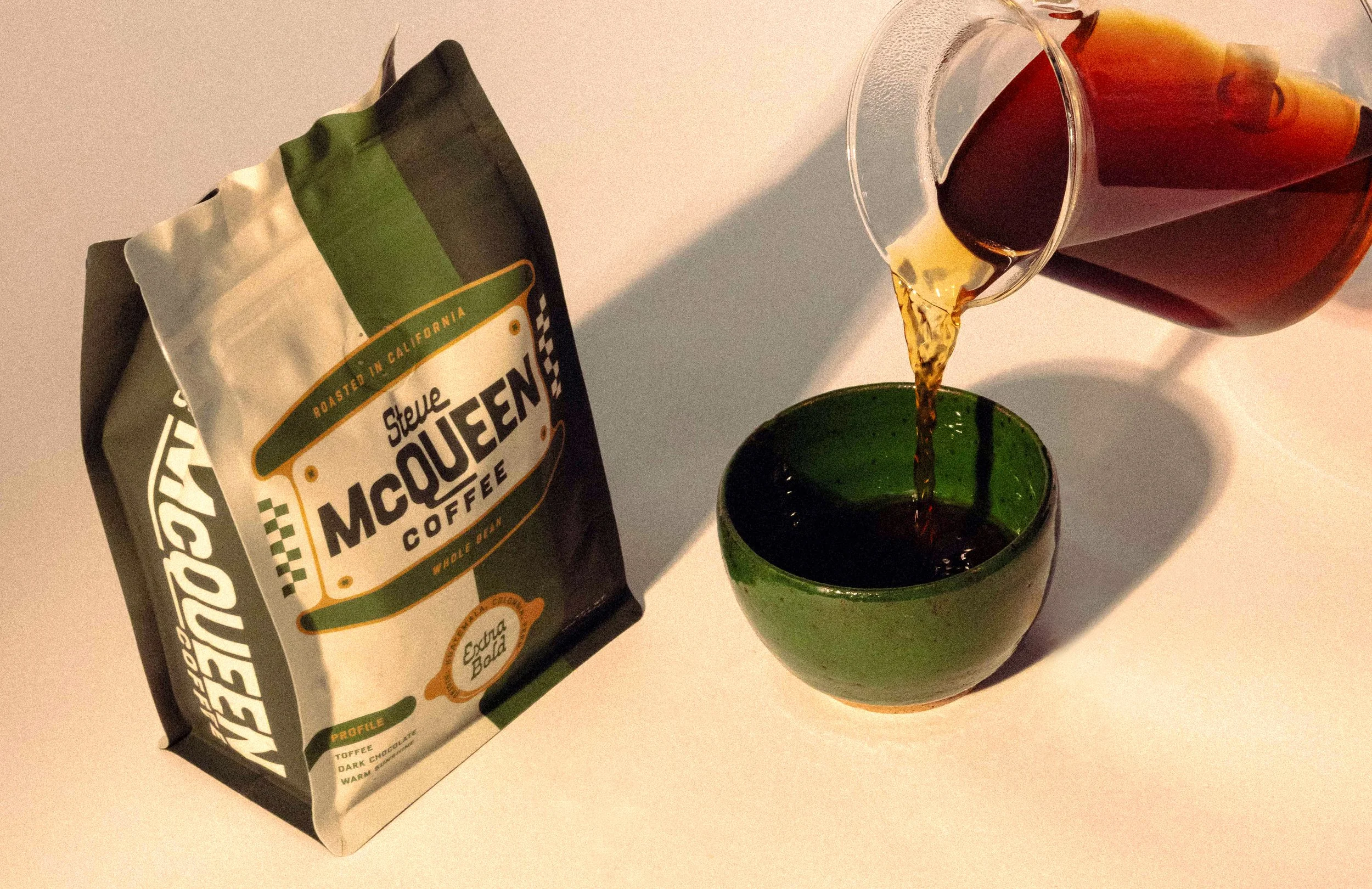 Craft coffee bag packaging featuring Steve McQueen brand identity being poured into cup