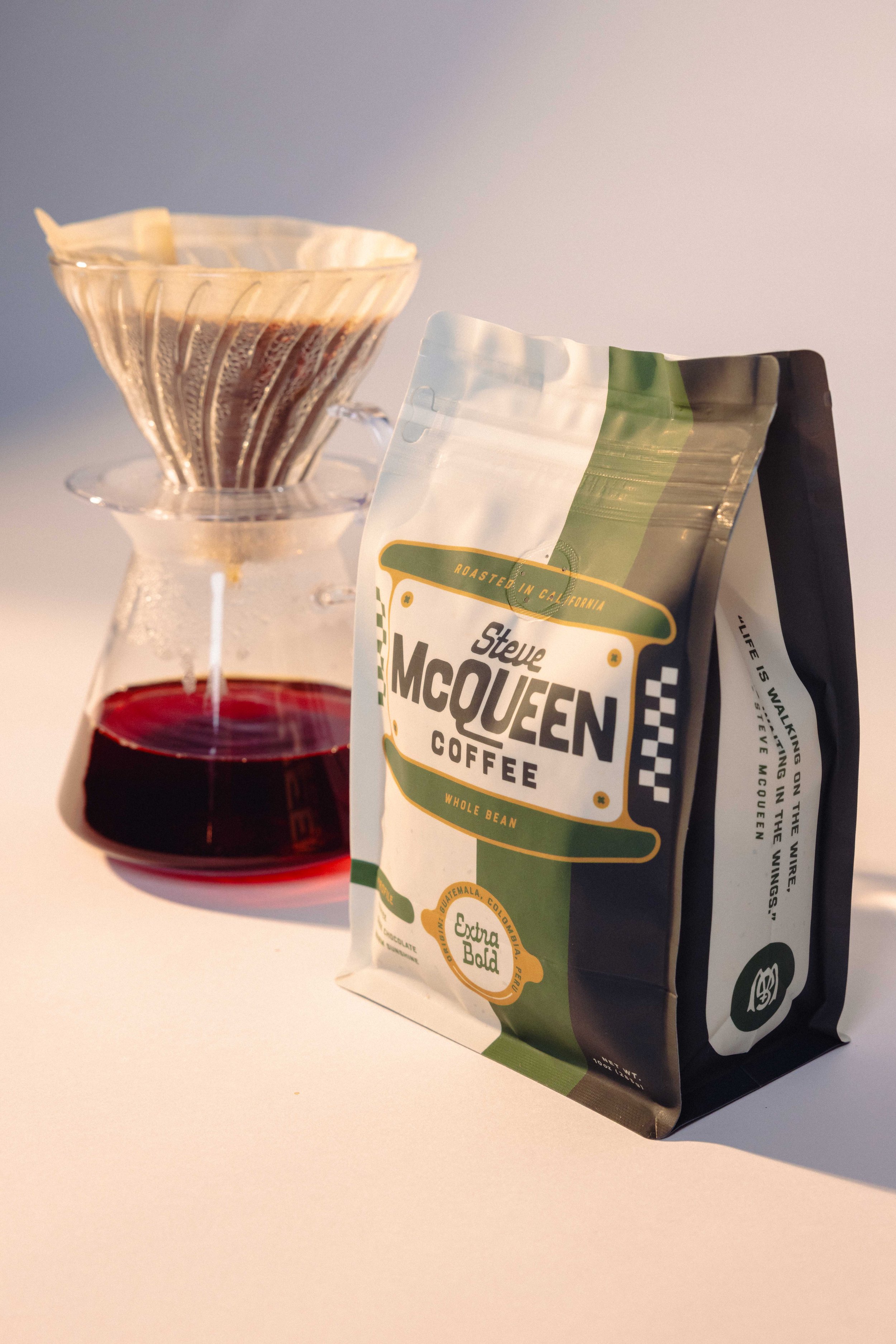 Vintage motorcycle-inspired badge design on Steve McQueen Coffee pouch packaging
