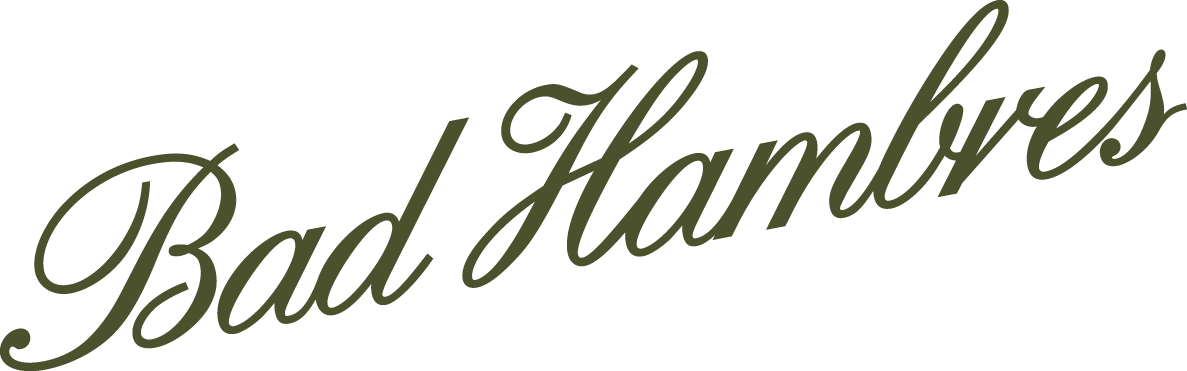 Script logo wordmark for Bad Hambres brand system and packaging