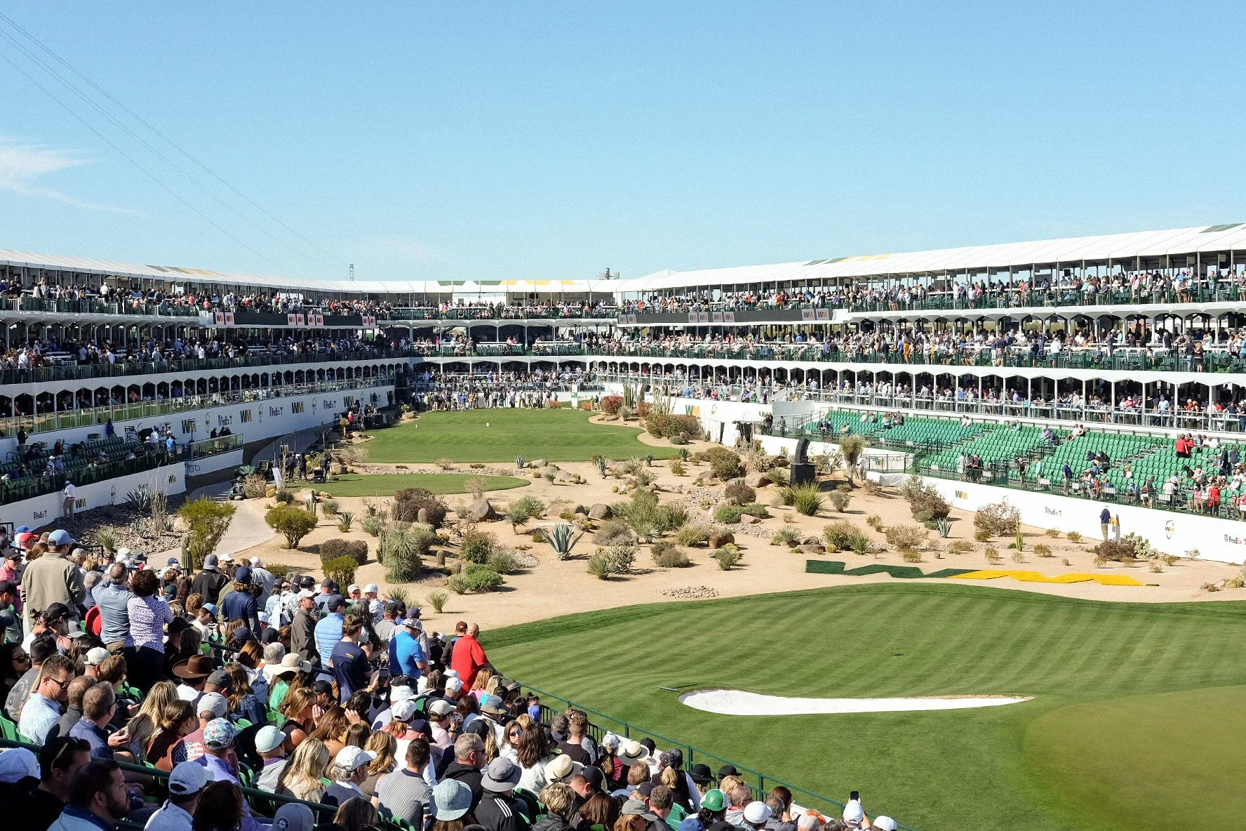 Packed crowd at Stadium Hole 16 at WM Phoenix Open wearing merch collection