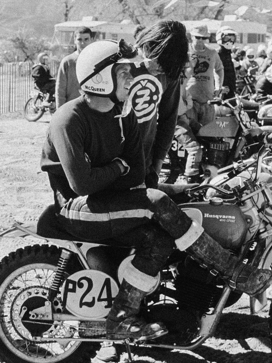 Vintage Steve McQueen photography on vintage motorcycle informing brand identity design direction