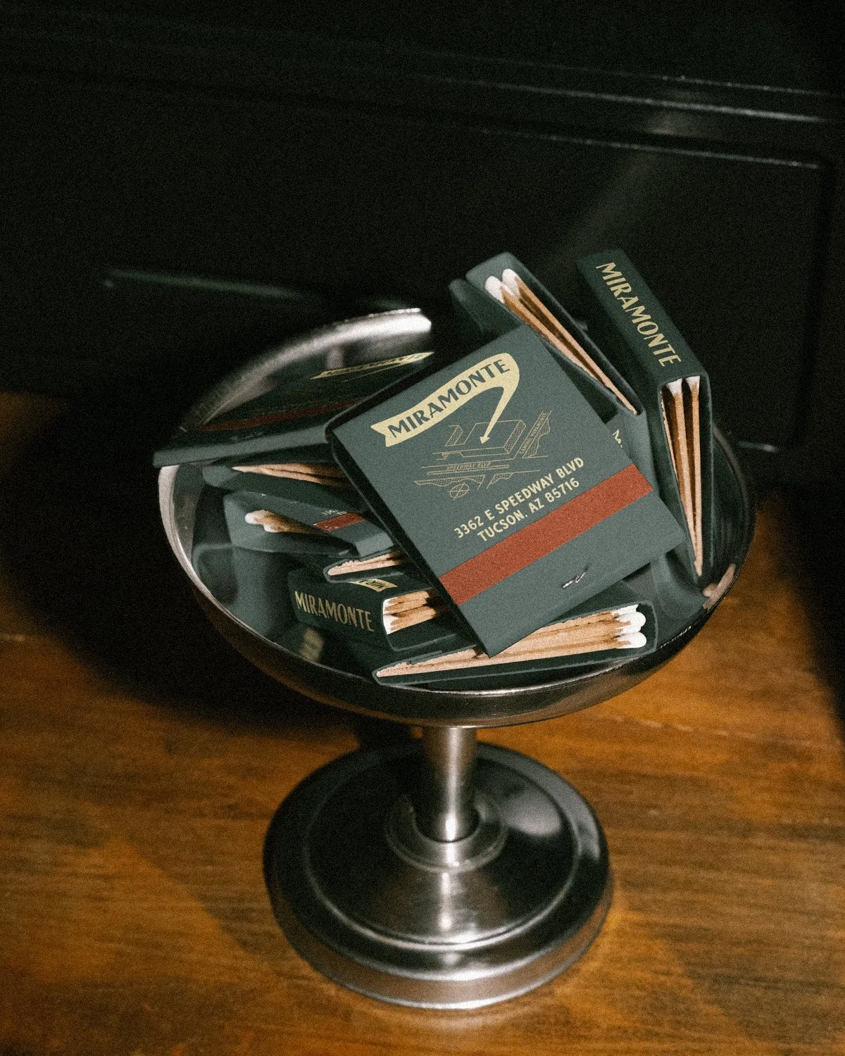 Vintage matchbook mockup featuring retro building illustration and map for Mirramonte branding