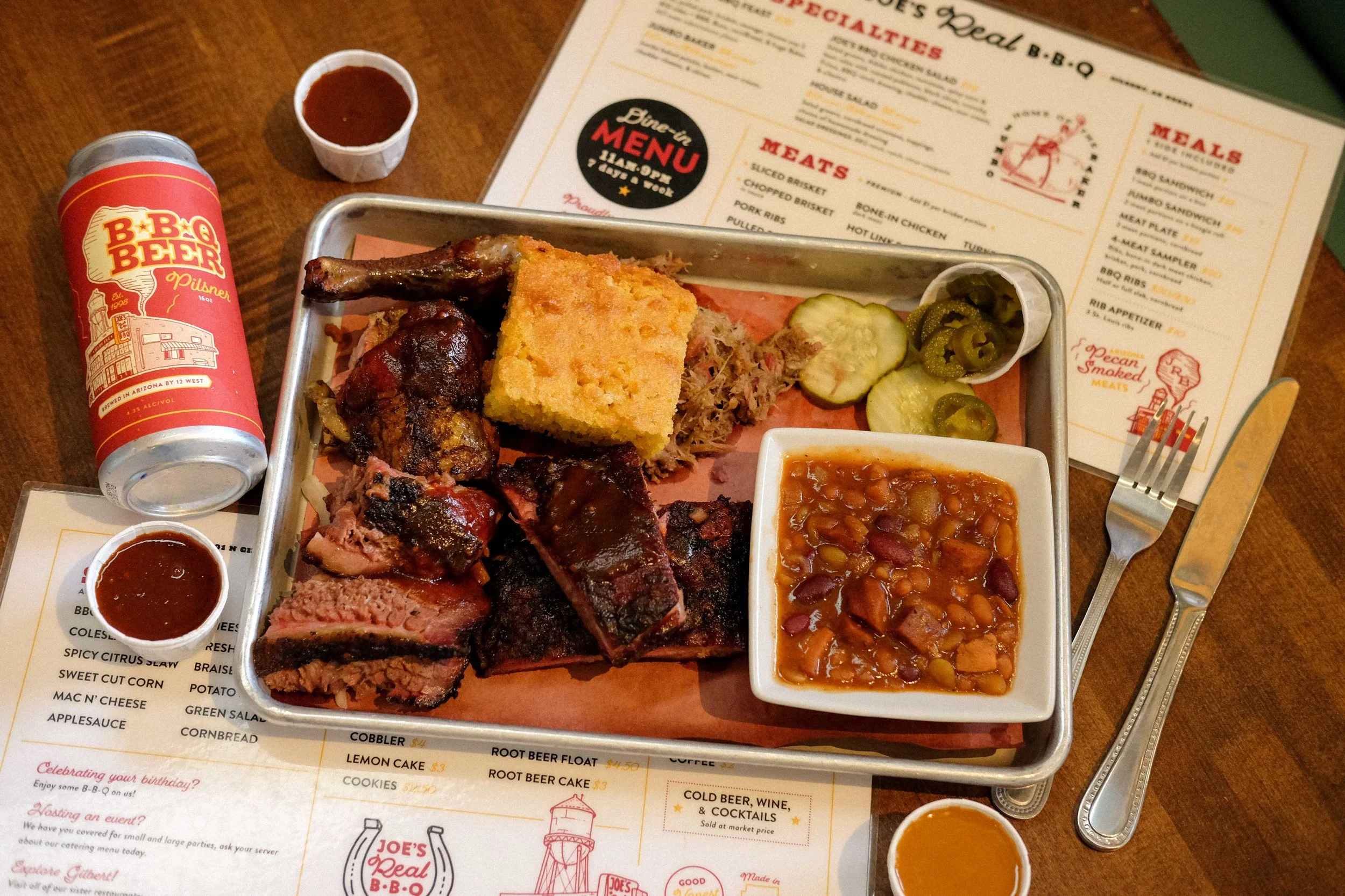 Joes Real BBQ menu design and beer packaging with food flatlay