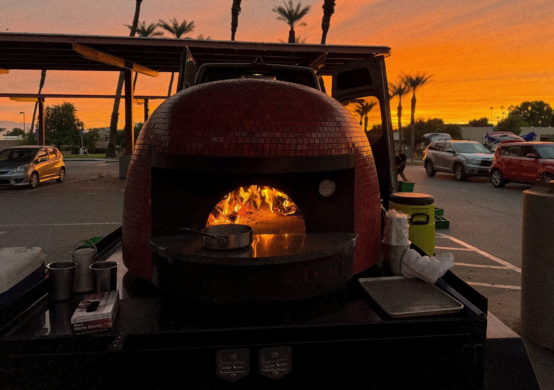 Noble Yeast mobile pizza setup in Palm Springs desert setting with sunset