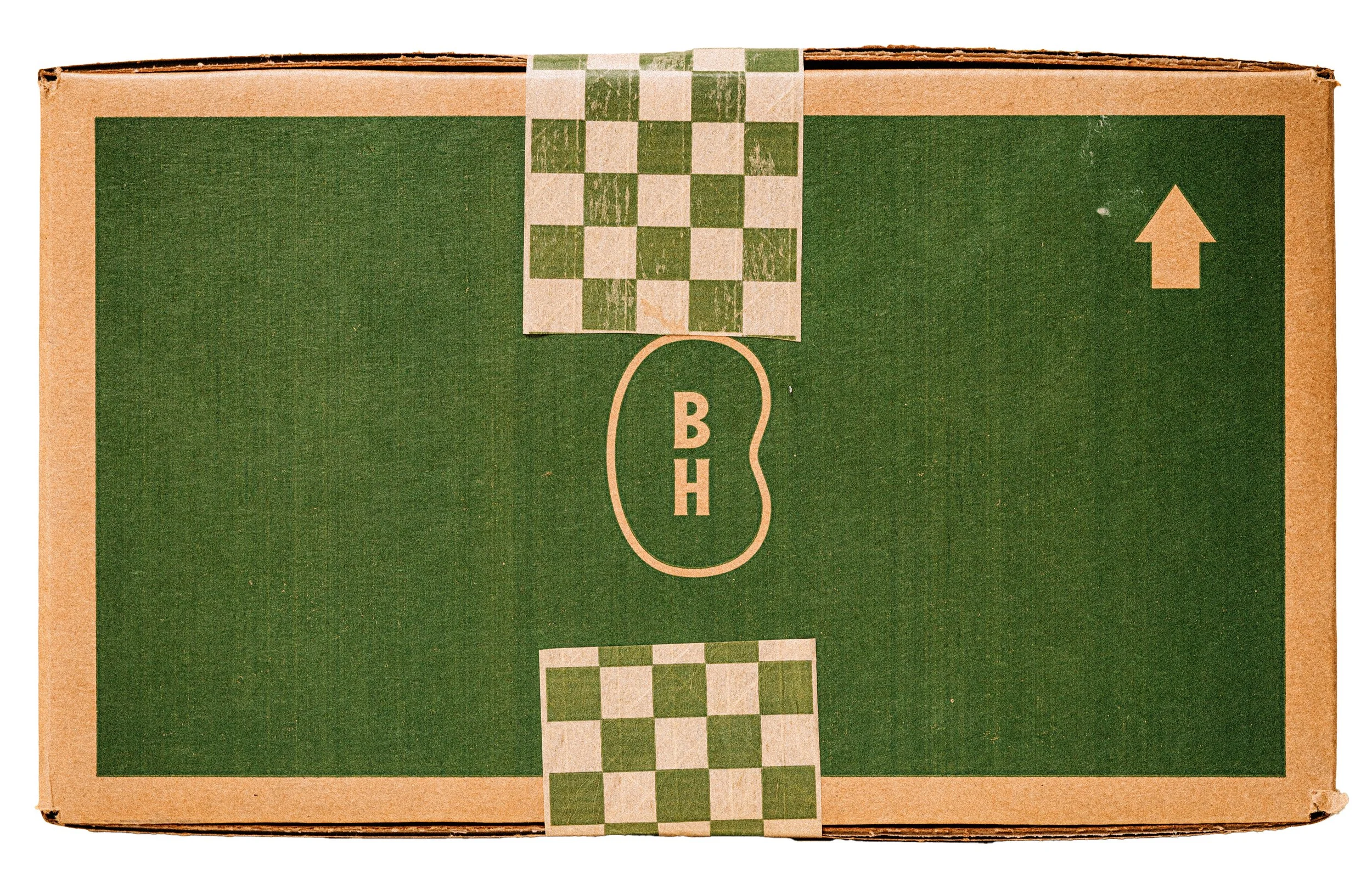 Shipping box packaging design for Bad Hambres frozen burrito delivery showing BH bean monogram