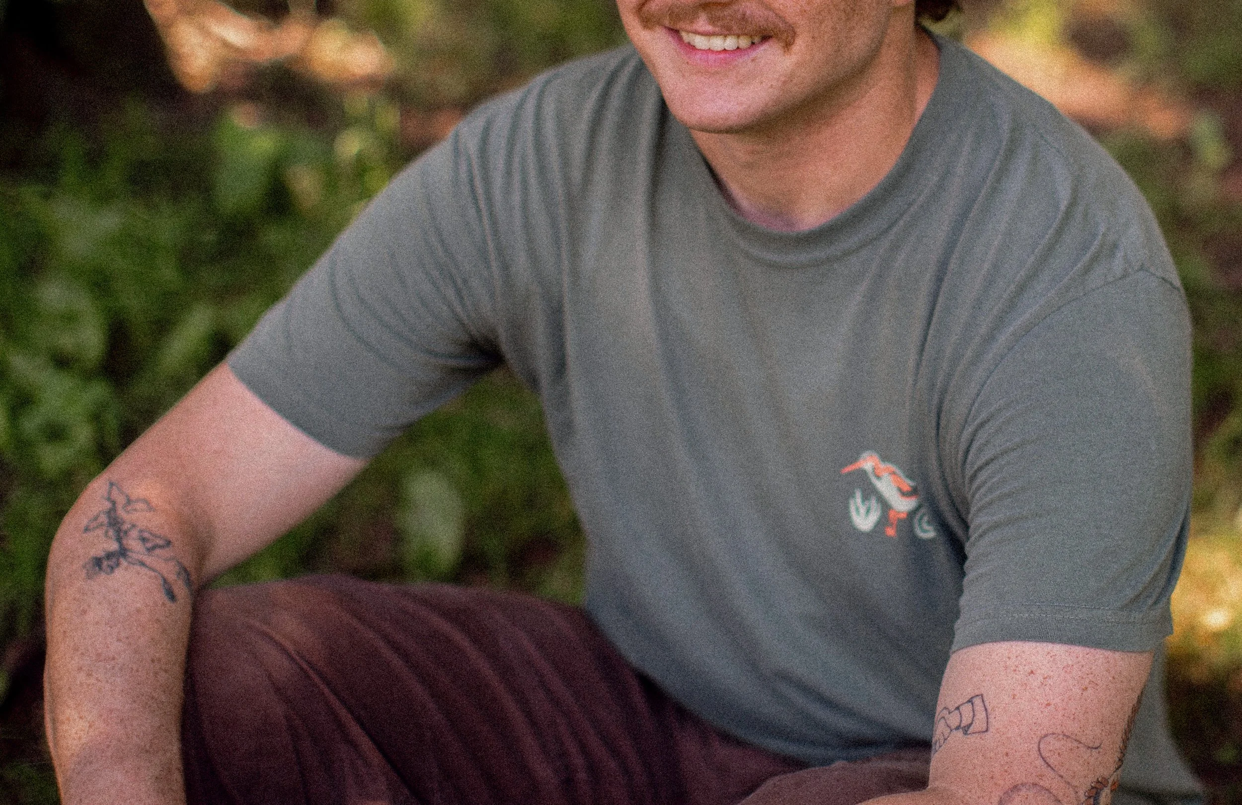 Bird Collective Wilson's Phalarope t-shirt design on model for conservation merch collection