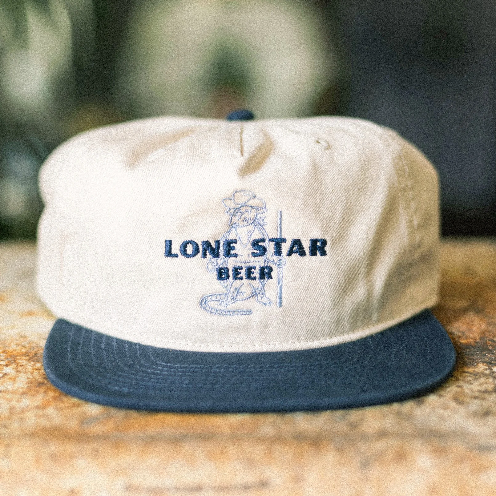 Close-up of Lone Star Beer pool club armadillo embroidered hat patch design