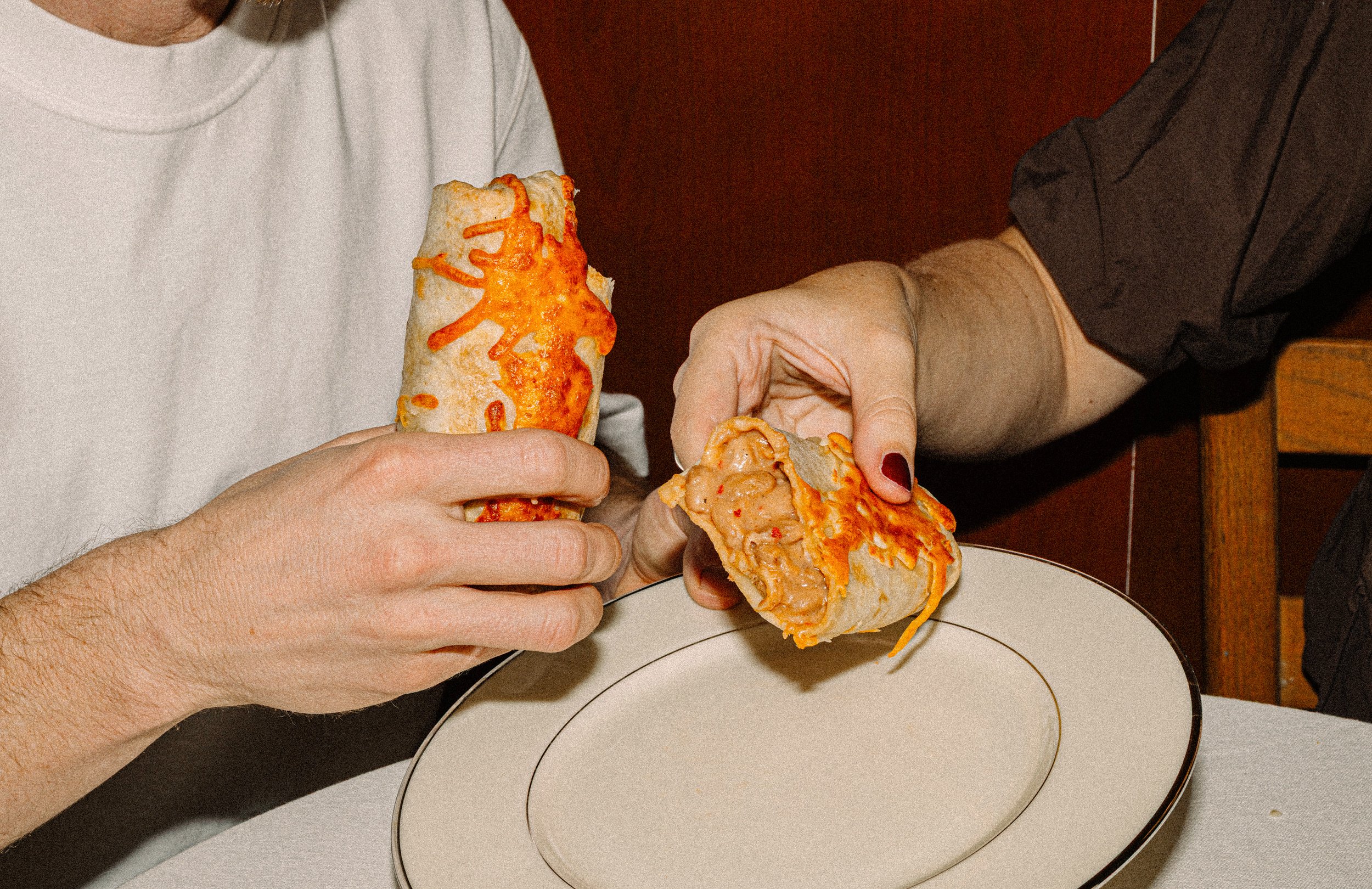 Bad Hambres burrito cross-section showing bean filling and quality ingredients