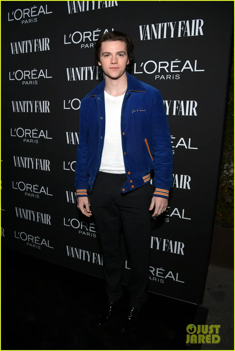 Just Jared Jr's Photo of Joel at the Vanity Fair and L’Oreal Paris Celebrate New Hollywood Party. Joel is wearing a Saint Laurent jacket, Kelly Cole shirt, Theory pants and Calvin Klein shoes.