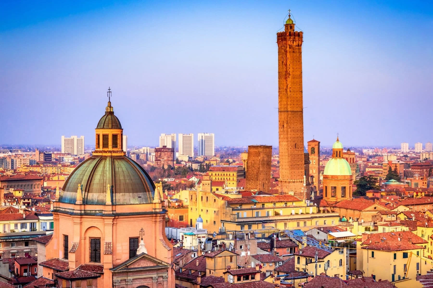 Bologna-is-a-city-of-porticoes-towers-and-delicious-Italian-cuisine.-Image-by-emicristea-from-Getty-Images-via-Canva.jpg