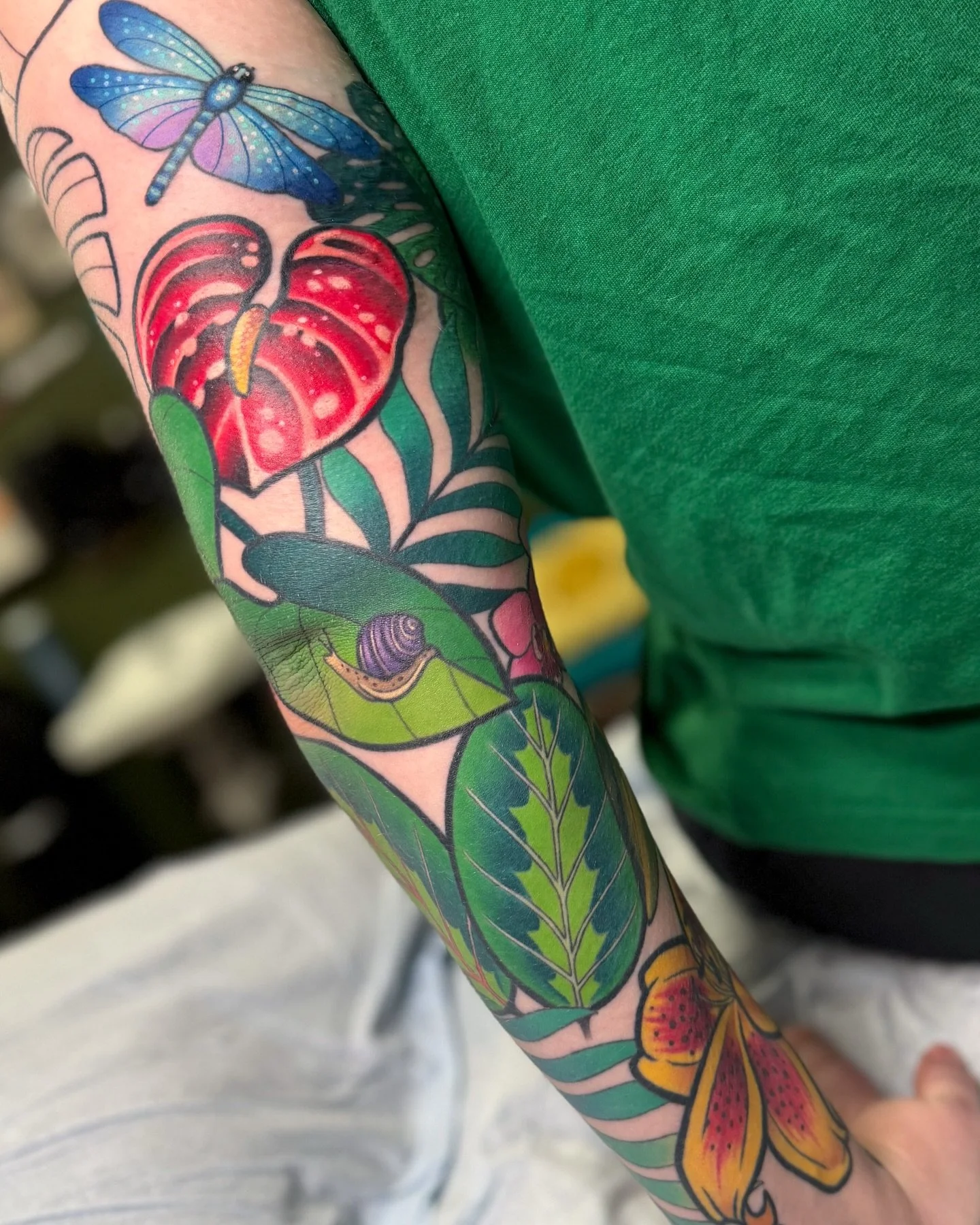 Another WIP on Sarah 🍃🪲 We&rsquo;re aaaalmost done with the foreground elements and then will be tackling the background ✨ Most of this is healed, the dragonfly color is fresh and the red flower color is healed w/ a light second pass. I really love