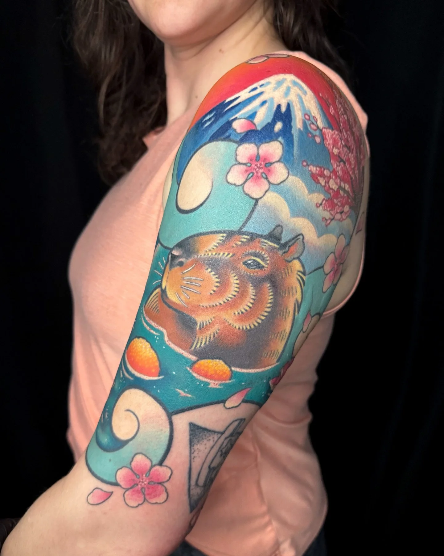 Finished capybara half-sleeve on Abigail 💕 (Healed with a little touch-up throughout.) Thanks so much Abigail, this was so fun to work on! 🍊

#ohiotattooartist #cutetattoos #colortattoos #capybaratattoo #cherryblossomtattoo