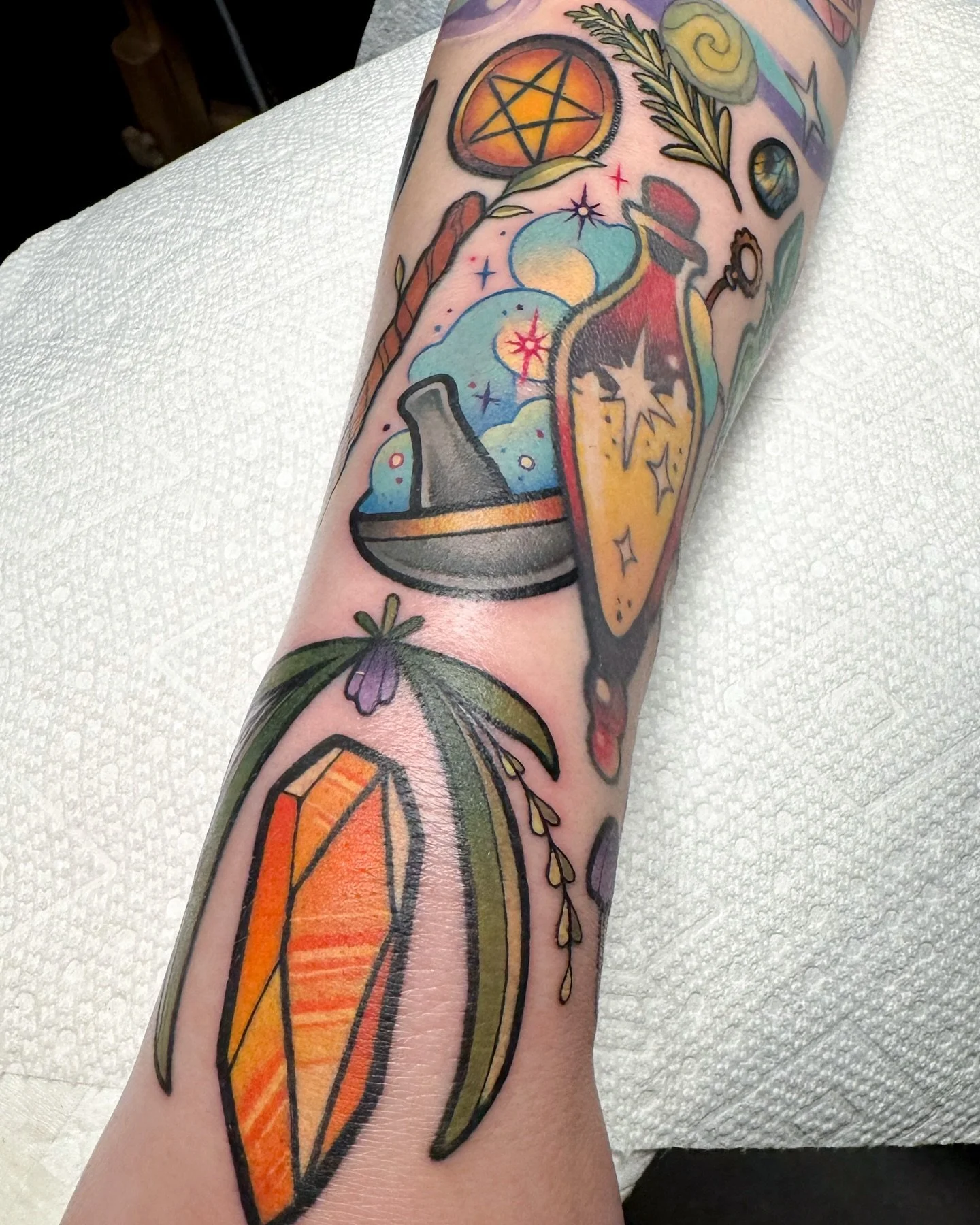 WIP on Kristin&rsquo;s witchy filler forearm! More to come but excited with what we were able to knock out yesterday!! ☘️💎💖🍄 The tarot suits (wand, pentacle, sword, cup) are healed from last time, the potion bottles are healed from a few years ago