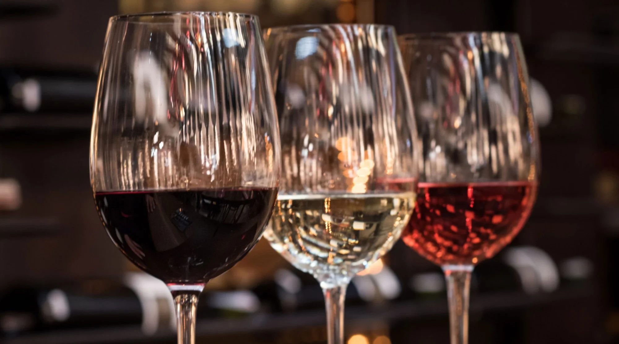 wine-glasses_andresr-iStock-GettyImagesPlus-468917818-LEDE.jpg