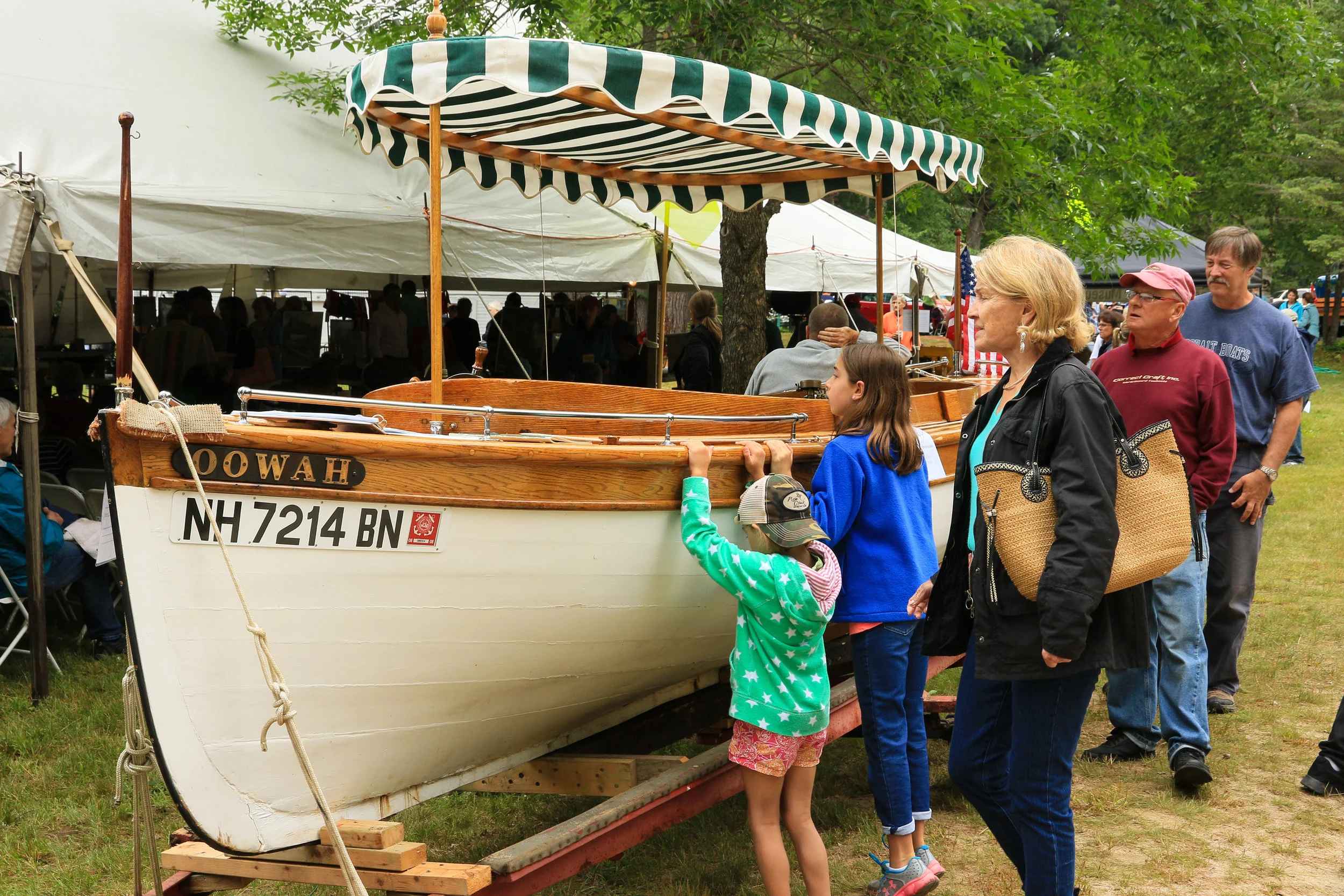 Checking out the boats before the NH Boat Museum’s Vintage Boat Auction