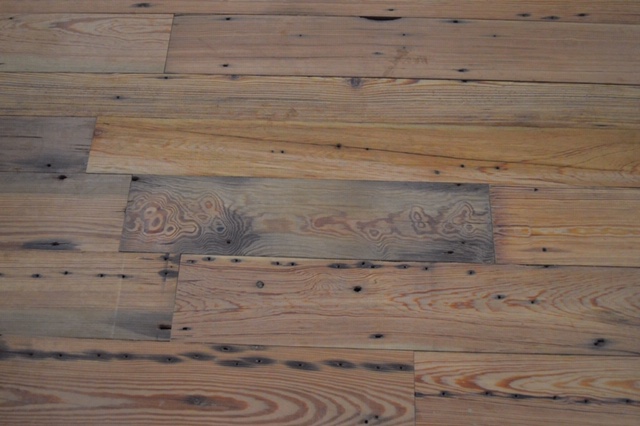 A portion of the floor crafted fro reclaimed wood