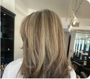 Blonde haircut and styling result at Salon Sonik in Pasadena