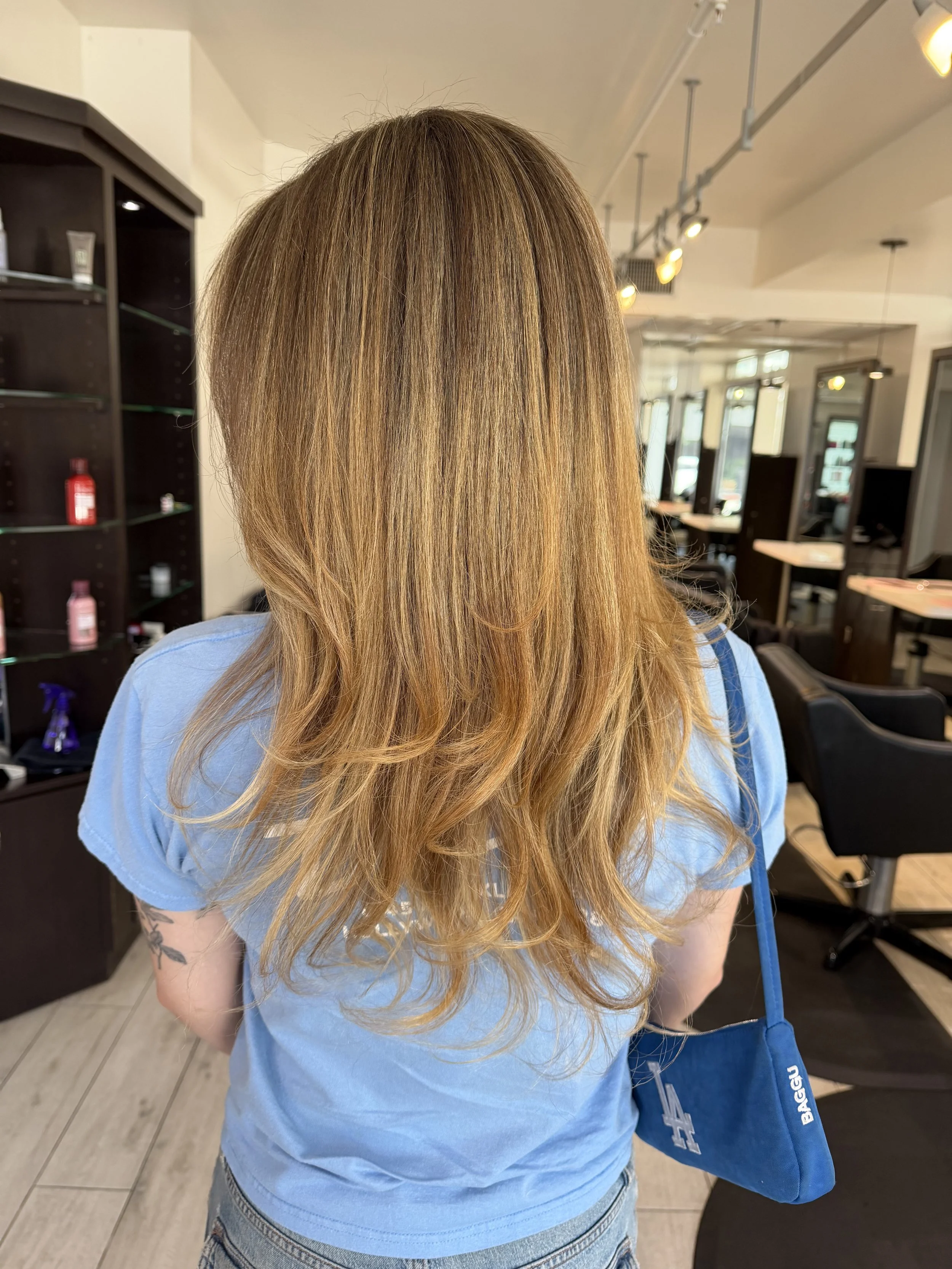 Golden balayage and dimensional highlights finished result at Salon Sonik in Pasadena