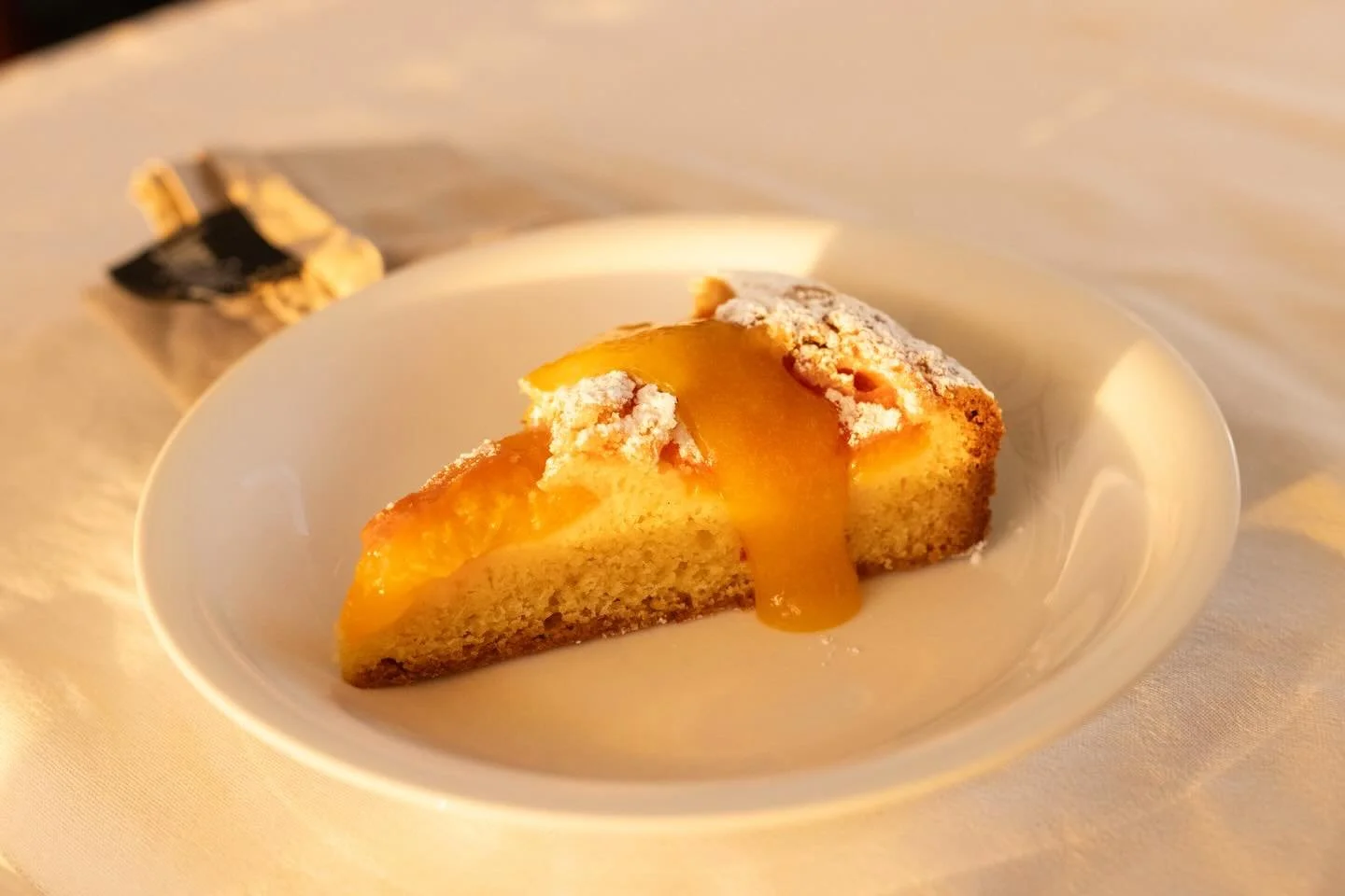 French Country Apricot Cake. This recipe has been a mainstay of my cooking repertoire for decades. You can use any fruit apart from tropical varieties, making it a versatile recipe and one to note. 

The sugary topping, encrusted around the baked fru