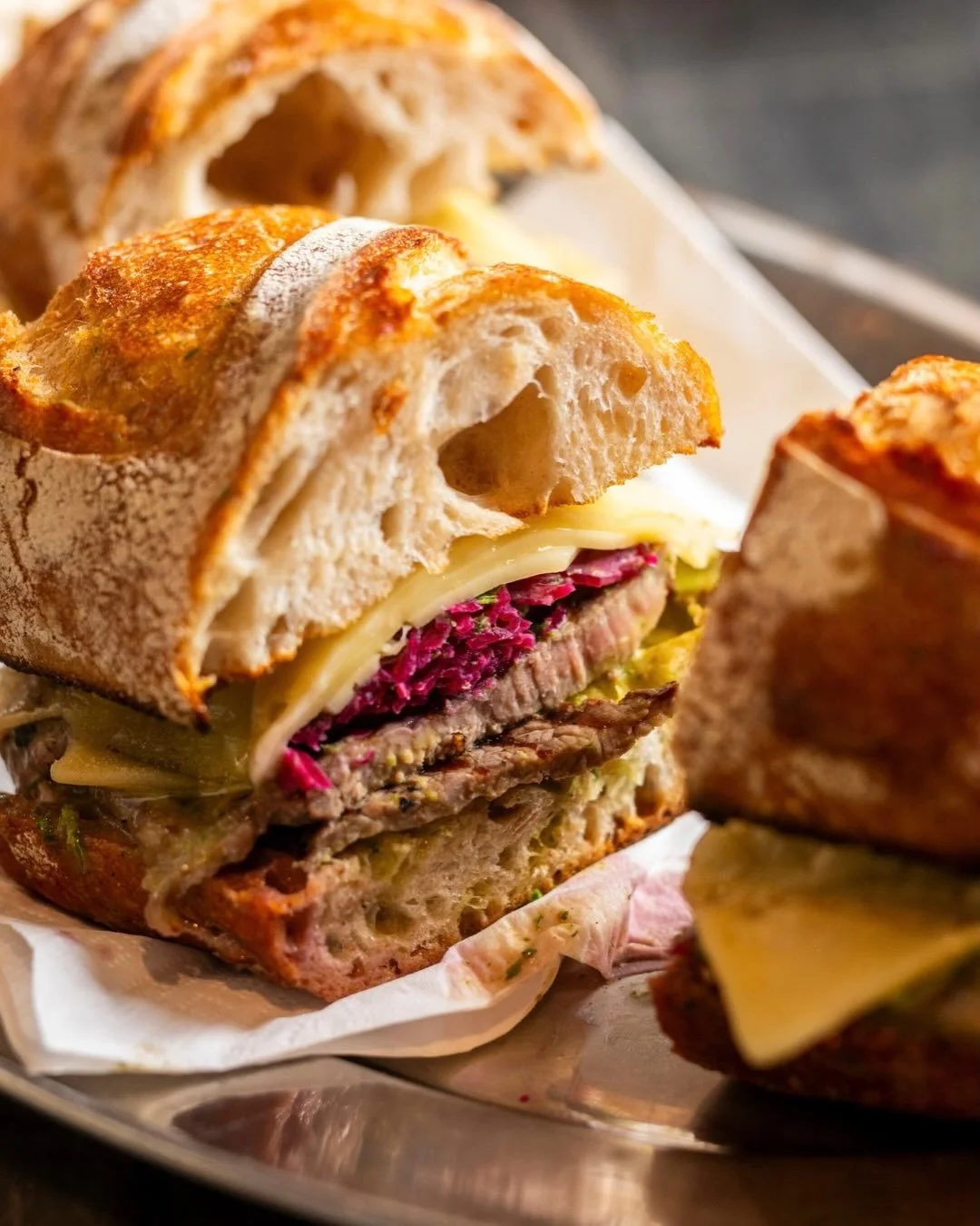Partly inspired by a Rueben, this minute steak sandwich is like a steak burger with really good ingredients, or takeaways at home. Great as a weeknight meal, and made with herby green mayo, sauerkraut, steak of course, and melted cheese - delicious.
