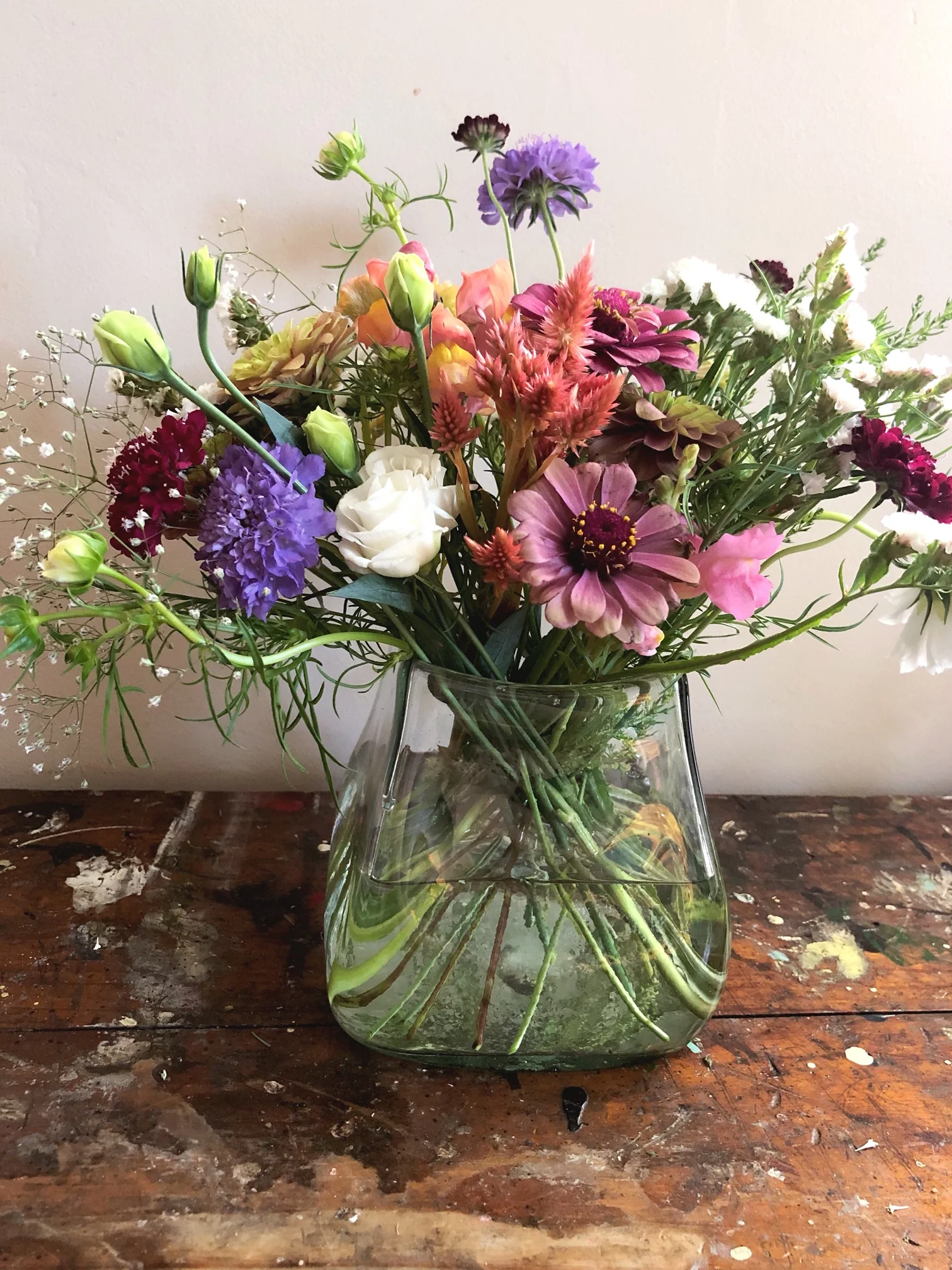 arranging farmers market flowers