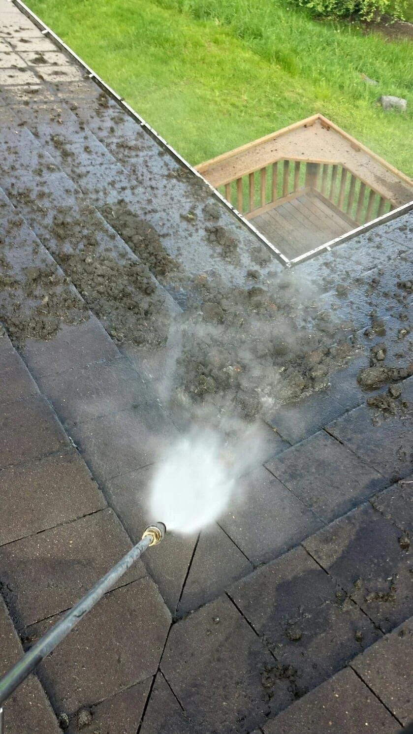 Tile roof cleaning project using surface-appropriate cleaning methods.