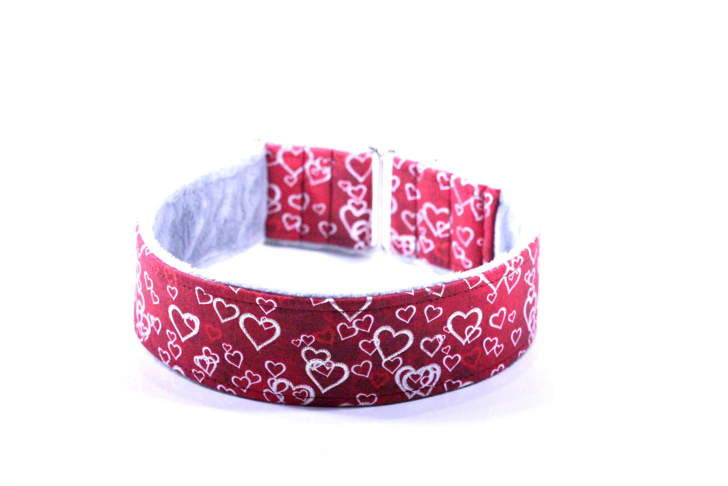 Scattered Silver Hearts on Red