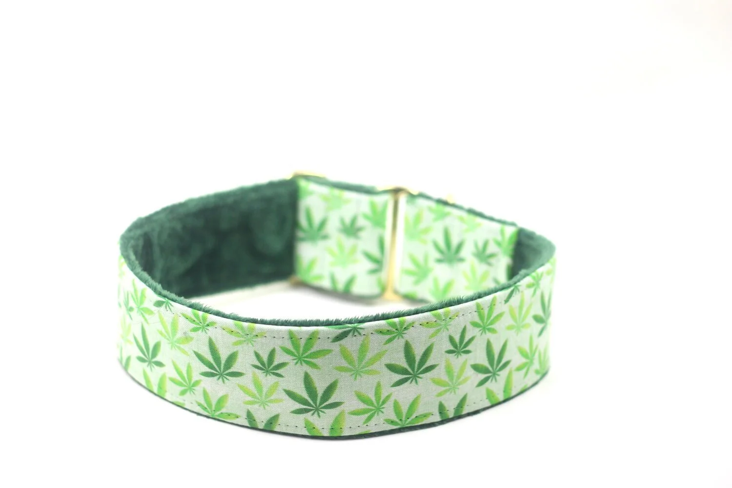 Marijuana Leaves on Green Linen