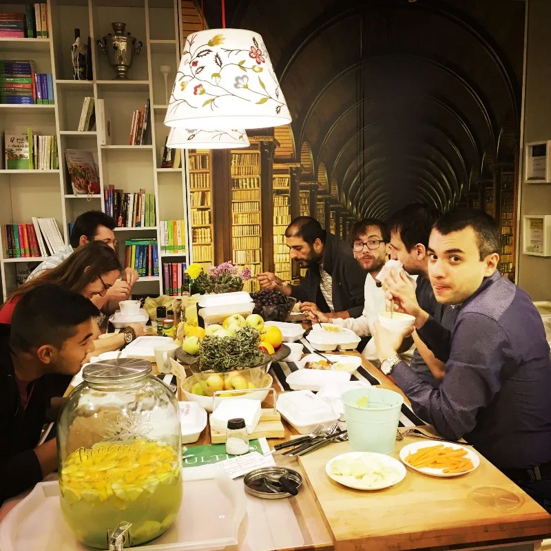 The team, gathered for lunch in Seneca Anticafe’s kitchen.
