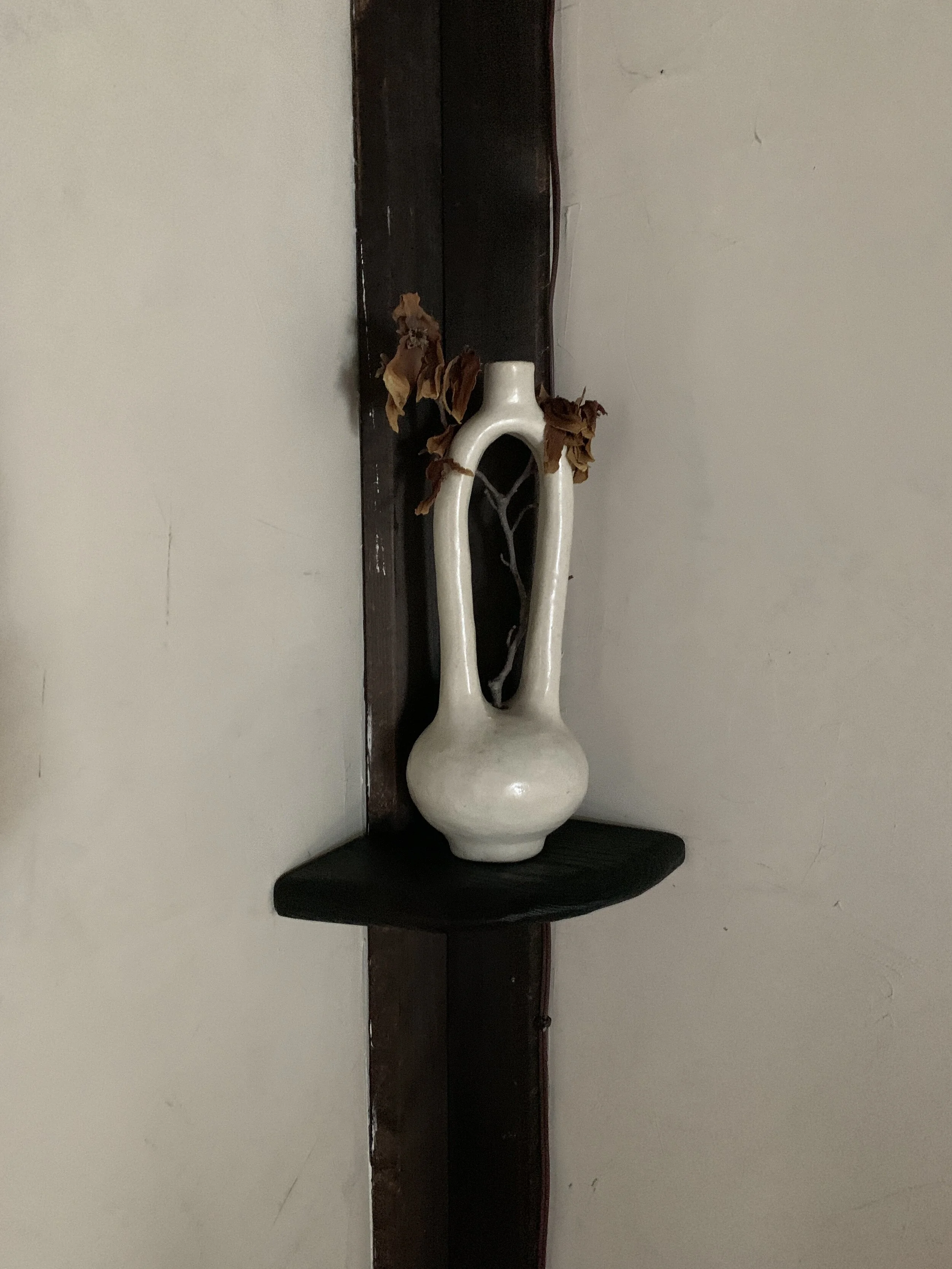 Fadden Sonnen hand carved floating shelves in burn Oak.JPG