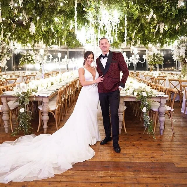 We are still swooning over this dreamy look we created for our #dspbride @thevineyards_li.  She asked for florals and greens from the windows to the walls and we made sure to deliver. 
Swipe for her gorgeous candle lit and vine filled reception, plus