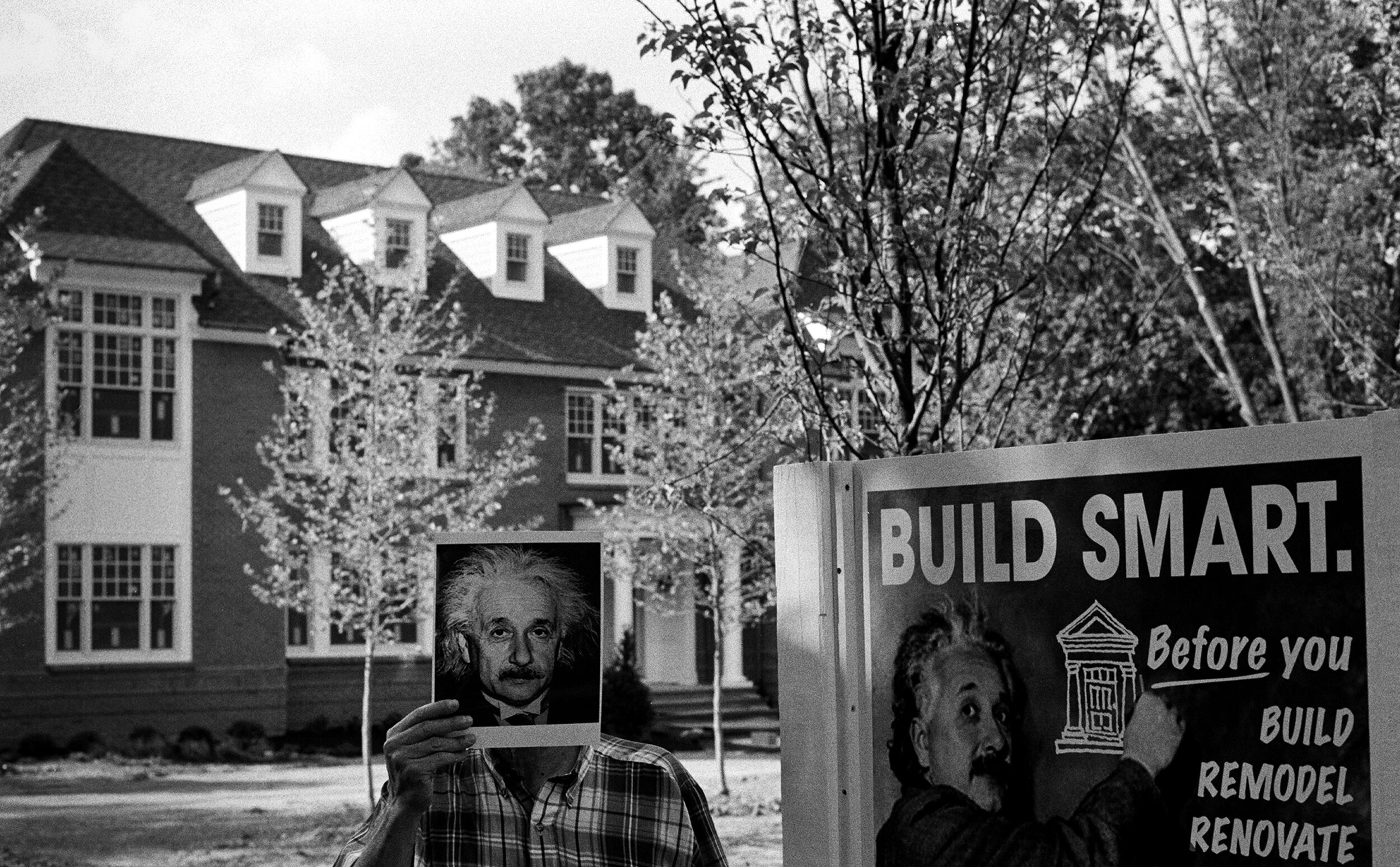 Albert Einstein with Builder's Sign.