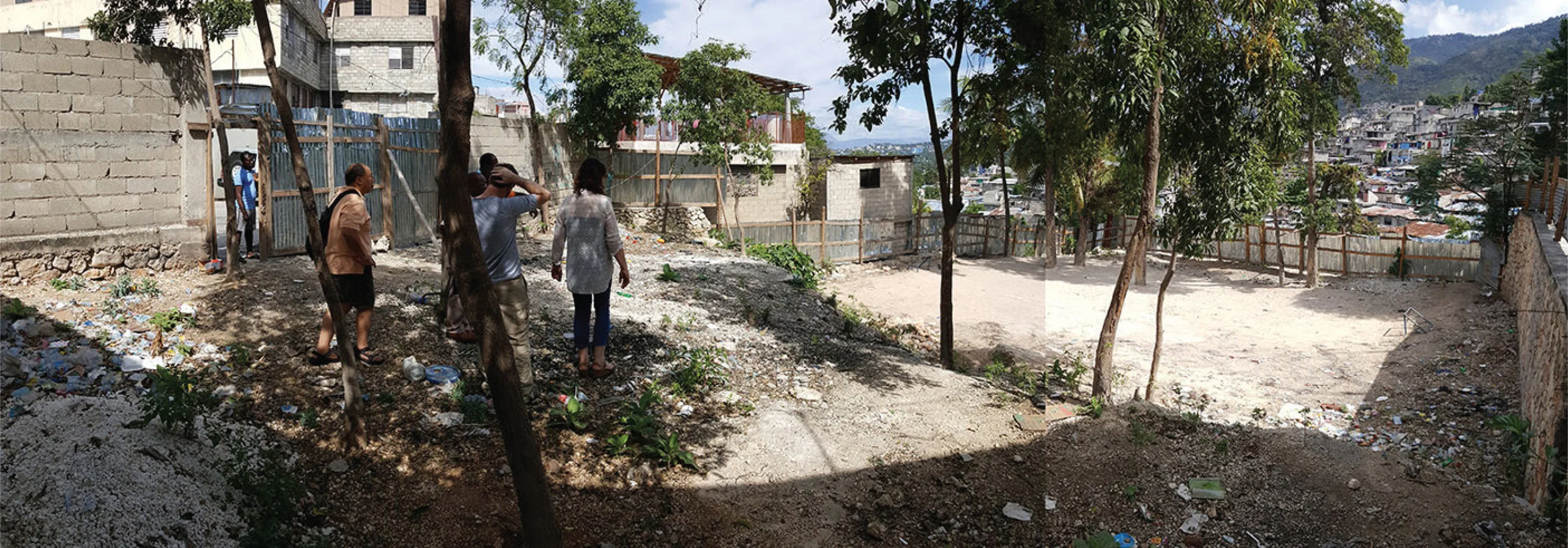 Inside walls of proposed site for playground.