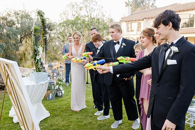 When I was asked to think out of the box for this blended ceremony... I masked off a heart on a 4&rsquo;x4&rsquo; canvas, filled up some water guns with acrylic paint and told them to aim straight! 🎨🔫 It&rsquo;s symbolic of the diversity and unity 