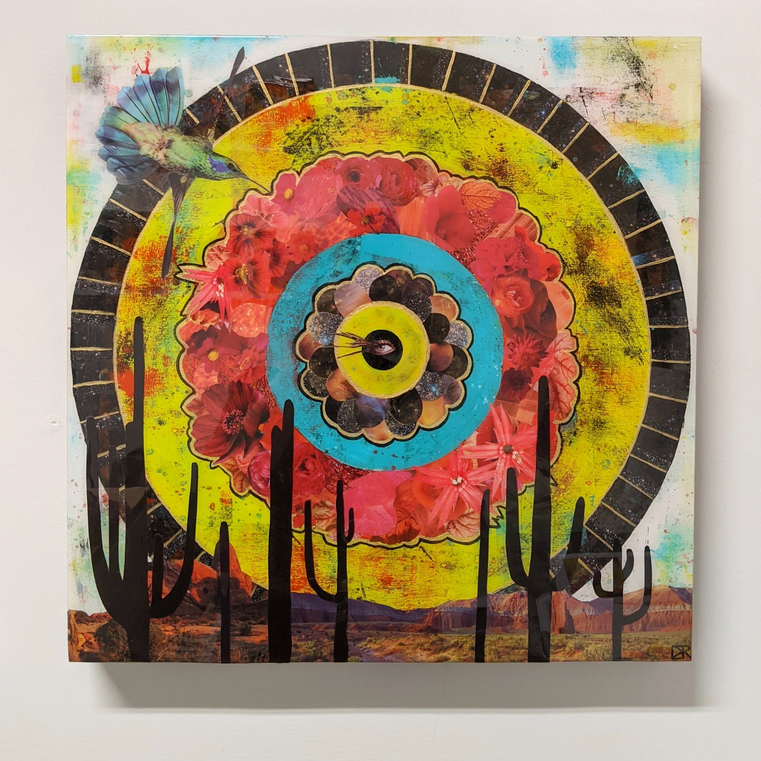 Kate Ritchie_Wheel In the Sky I, 18x18, acrylic, collaged magazine images, and resin on cradled birchwood panel..jpeg