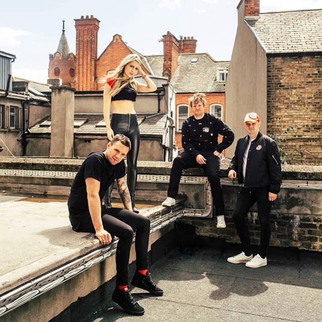 3 degrees today so good time to put up this photo of us in 32 degrees Dublin sun on a roof looking like a metal band that is kinda sick of looking angry . Pic @ruthlessimagery