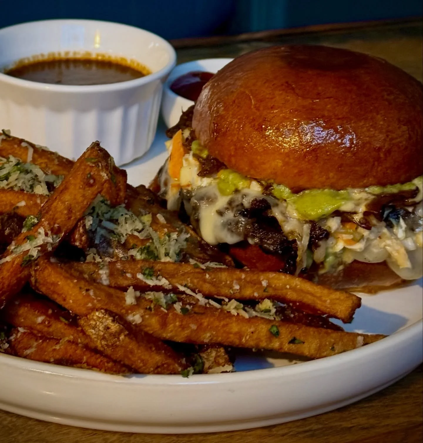 The Golden Smash Burger - our entry into the Downtown Burger Battle this year. Oxtail, sirloin, bone marrow mayo, cilantro verde, jalapeno cheddar, Napa cabbage slaw, bone peppercorn sauce, house made potato bun, and a whole lot of love. Our Chef AJ 