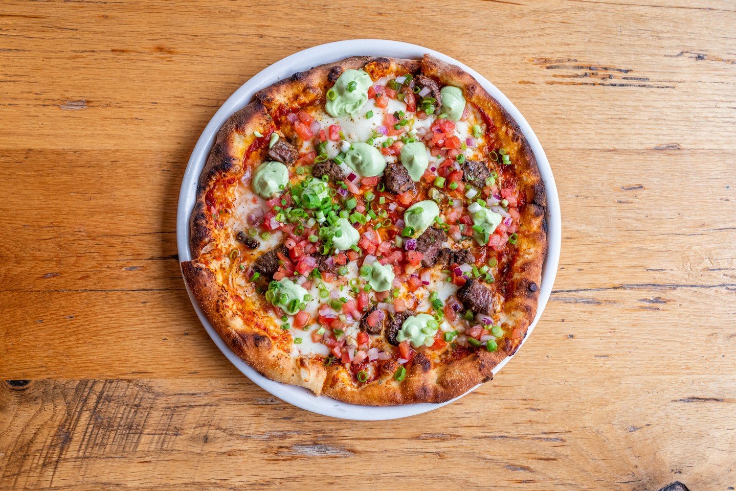 new favorite pizza unlocked: carne asada 🔓

hand-crafted with oaxaca and mozzarella cheeses and finished with fresh pico de gallo. this isn't your average pizza night.

order online or join us at your neighborhood go-to.

#matchbox #matchboxrestaura