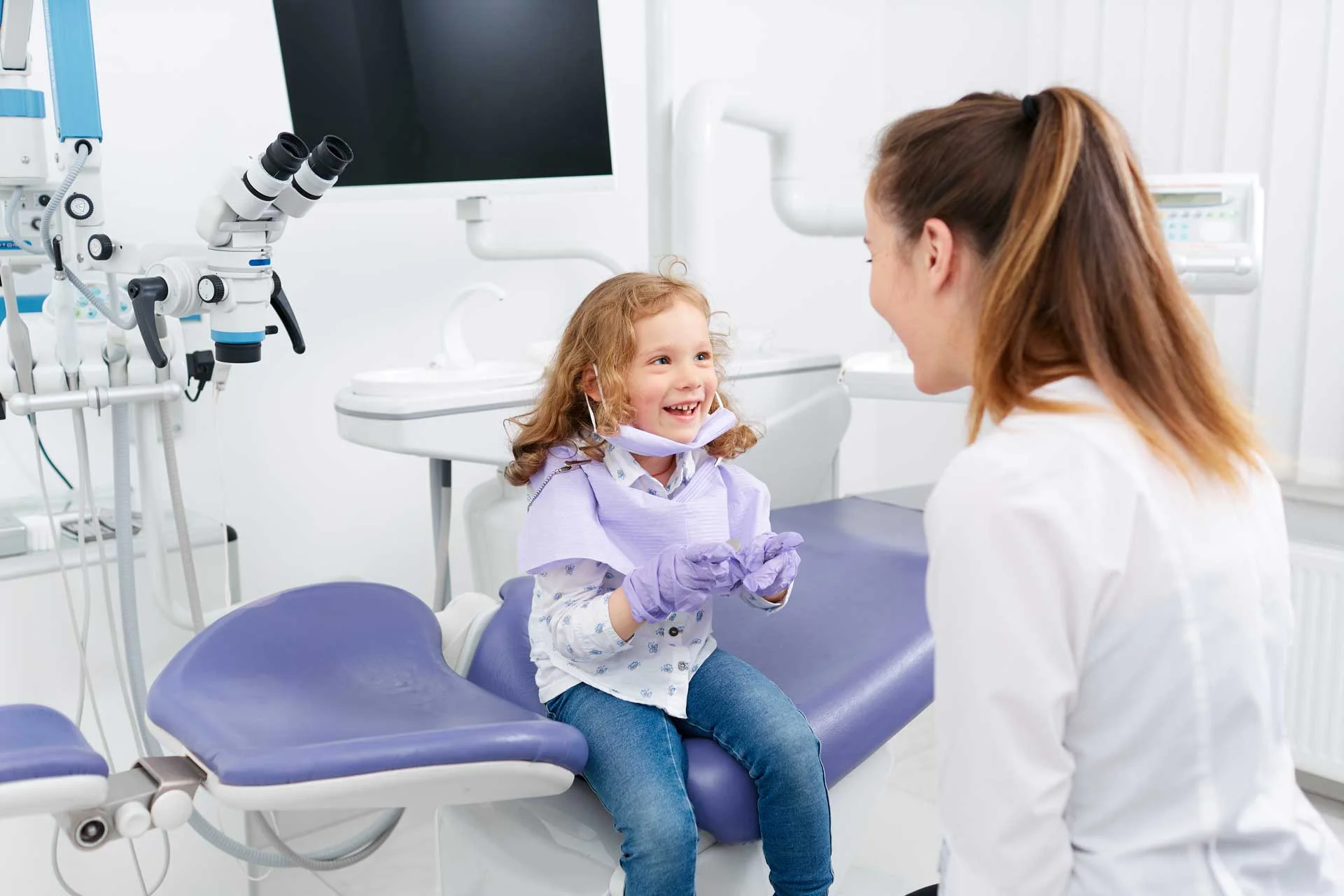 little-girl-playing-dentist-in-the-treatment-room.jpg