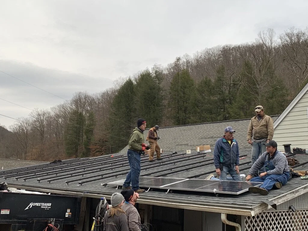 Brackets installed, first panels going down.