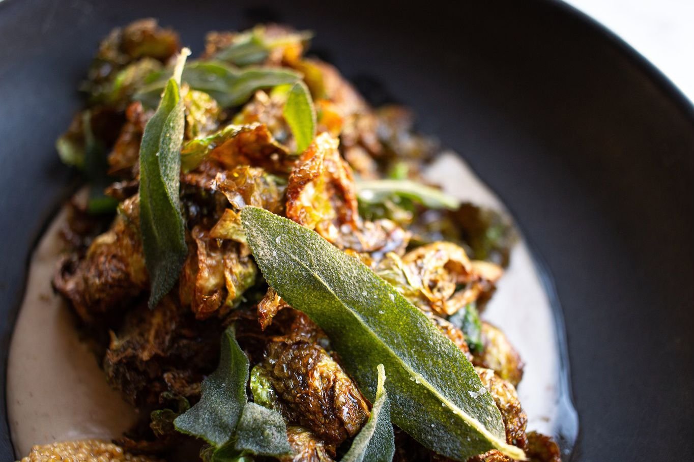 CRISPY BRUSSELS SPROUTS 🌱 
coconut soubise &bull; sherry gastrique &bull; pickled mustard seed &bull; crunchy sage
(Gluten free!)

#vegan #plantbased #spokanewashington #spokaneeats #pnwvegan