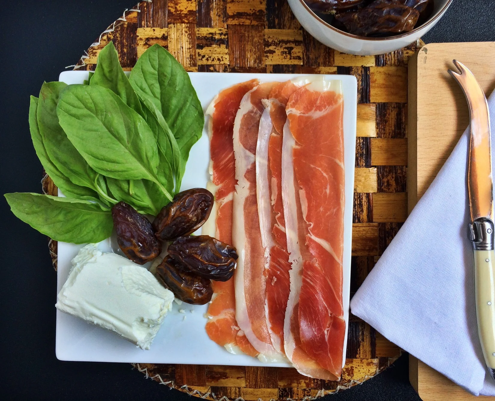 Prosciutto Wrapped Dates with Goat Cheese and Basil