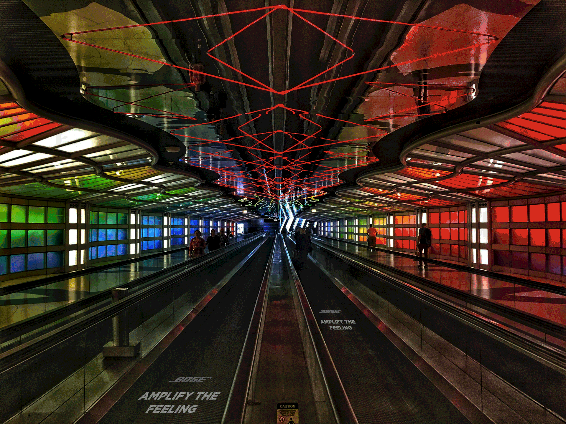 To take the experience into 360, Chicago's O'Hare airport passageway will serve as a music projector with the colorful installation it already has. Immersing the listener in a fun, colorful experience while listening to the music in the speakers.