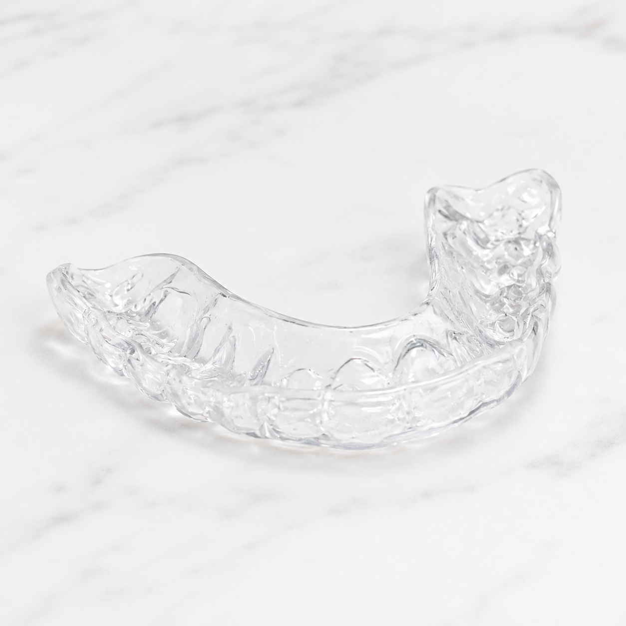 Custom night guard designed to protect teeth from grinding and clenching at The Smile Space.