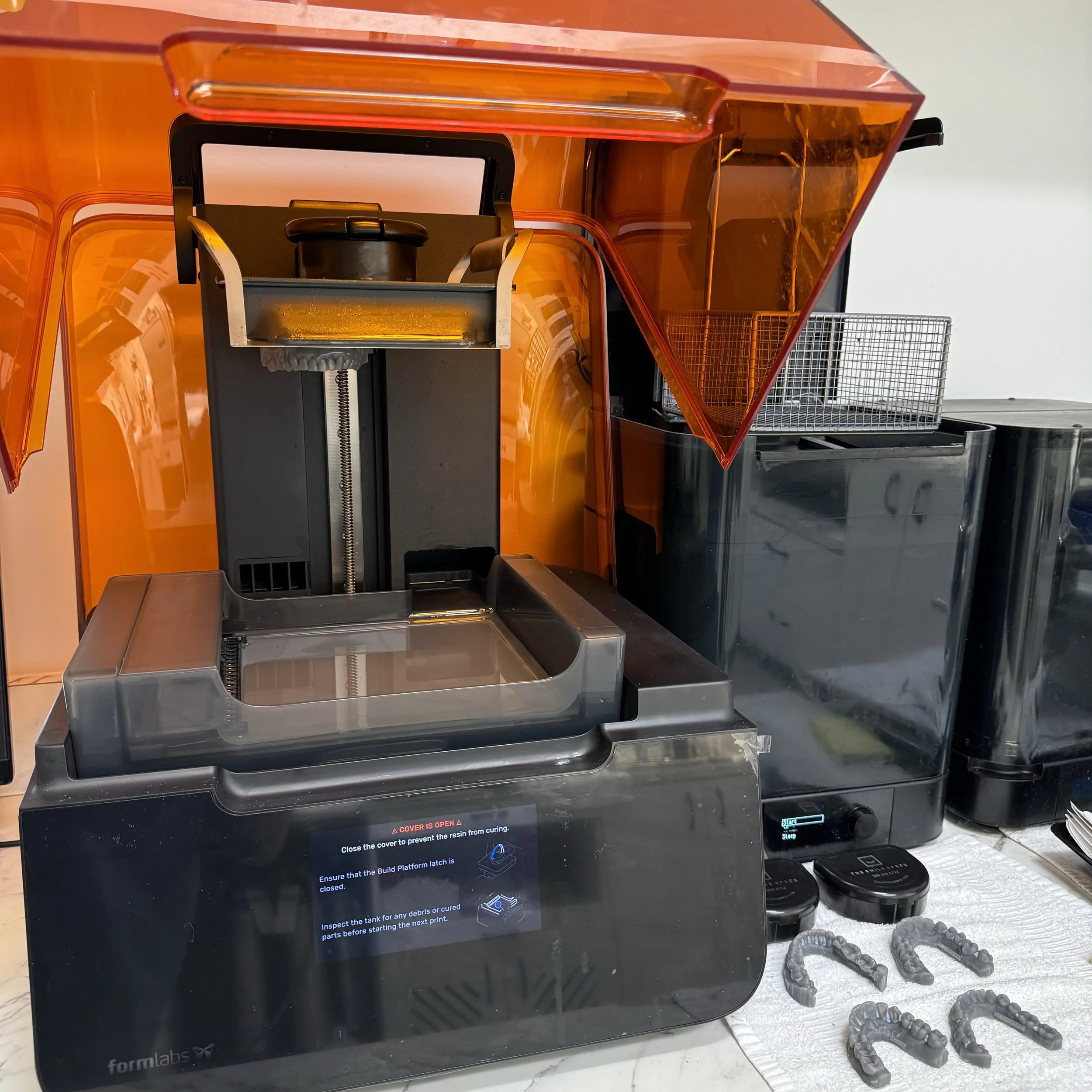 Formlabs 3D printer used to fabricate custom retainers, orthodontic models, and other digital dental appliances in-house at The Smile Space.