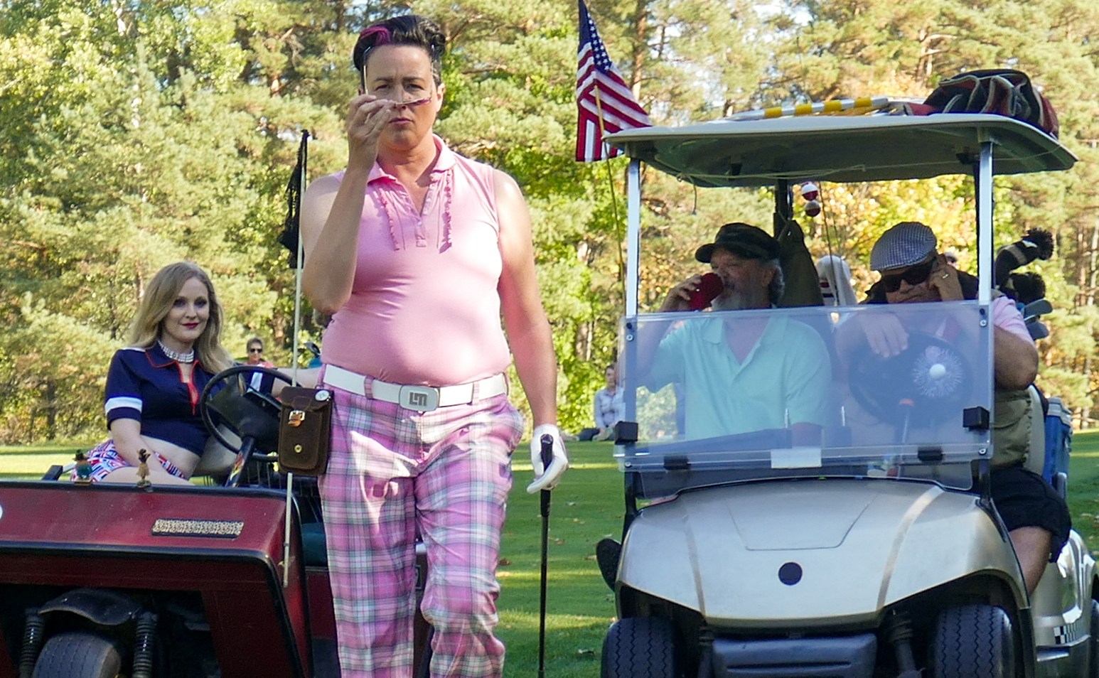 Angela playing golf champion Tracy in Eagle and the Albatross.